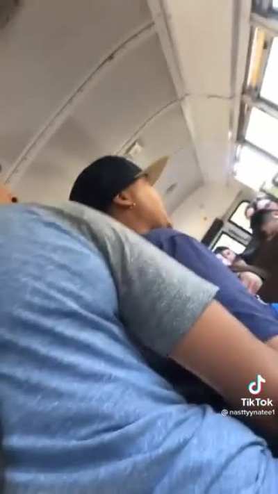 He threw something out the bus window, then caught a red light.