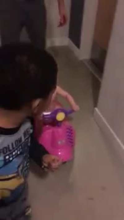 My little 5 month son driving a motorized scooter into a wall.
