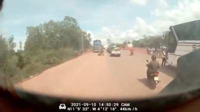 Truck Crushed a Car While Pedestrians Ran Away