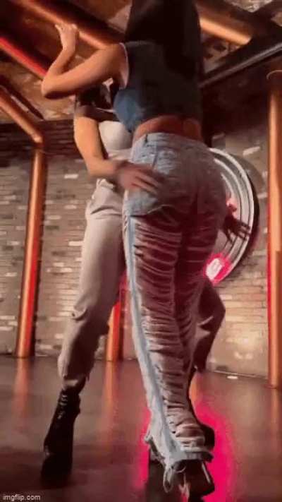 Brie grabbing Nikki's ass