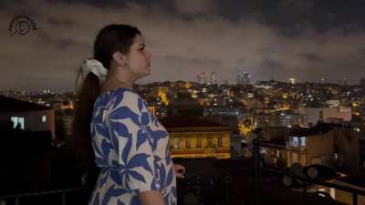 Balcony Bliss Girl in Blue Dress Smoking