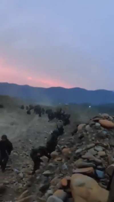Meitei militants laying down suppressive fire 