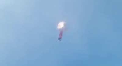 Launching a balloon full of fireworks right above their heads