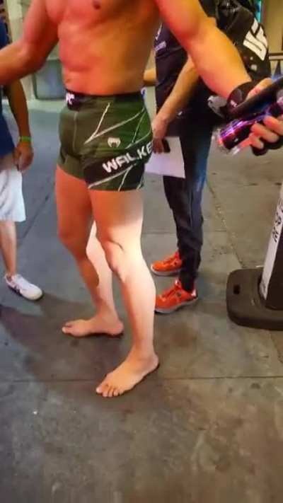 So the UFC just kicked Coach Kavanagh and Johnny Walker out of the arena they didn't even give Walker time to change 😂