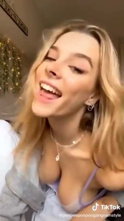 Music is annoying, but her tits sure are nice!