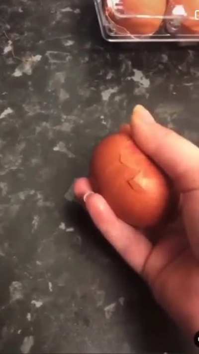 Little girl getting excited over egg hatching