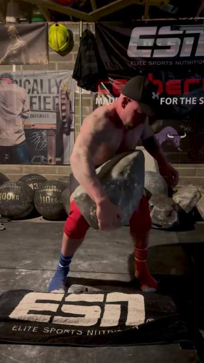 Lifting 110kg/242lb stone using one arm