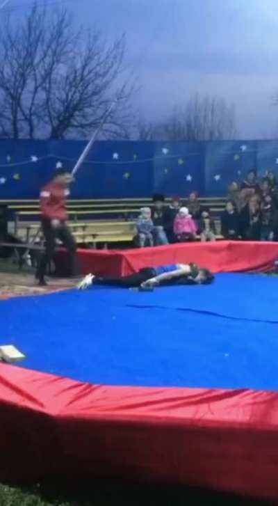 Snake handler get his neck crushed in front of his audience while performing