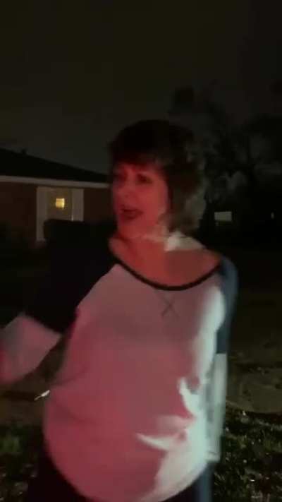 Racist Karen screams at father and son changing tire.