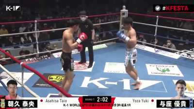 Yuki Yoza lands a slick little sweep on Taio Asahisa