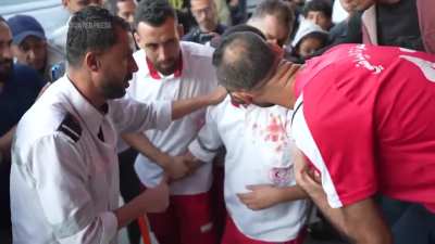 A Gaza medic realizes he&rsquo;s carrying his own mother&rsquo;s body, killed by an Israeli airstrike