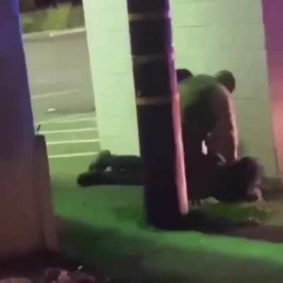 They secluded him behind a wall and looked around to see if anyone was watching so they can beat him... this is why we protest