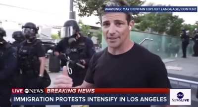 ABC reporter Matt Gutman keeps cool while heated LAPD officer loses it