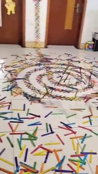 popsicle stick dominos, launched with a firecracker
