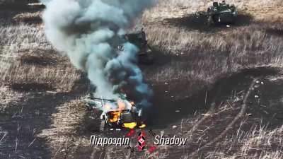 Another video by the Ukrainian "Shadow" drone unit. Showing the drop of an US M67 grenade into the open hatch of a Russian BMP-2.