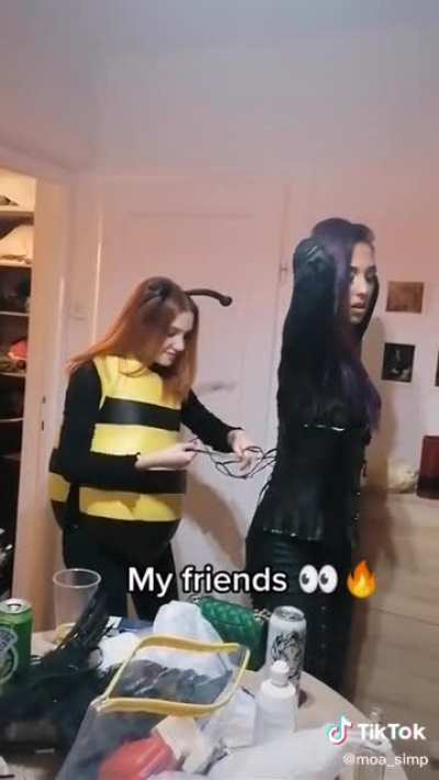 Why is a bee helping someone put on a corset ?