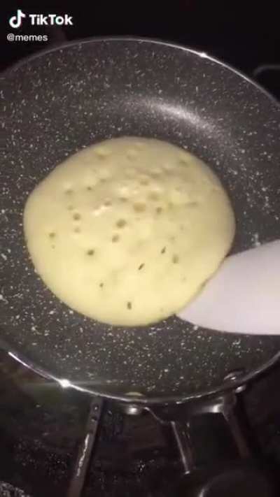 woman flips pancake. what happens next will shock you
