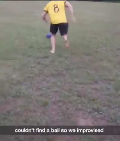 playing soccer with a bowling ball