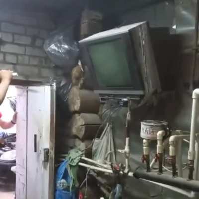 "Mechanicus adept fixing pictscreen" ca. M41 colourised