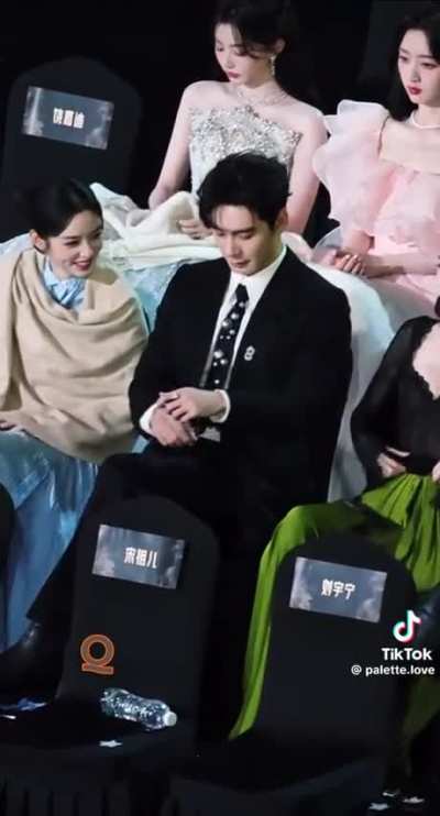 Pretty sure he asks do you want to switch chairs