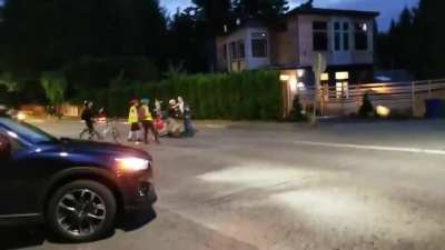 Seattle bikes block road so that rioters can march in rush hour. Local hero: "Get the F--- outa my Neighborhood"