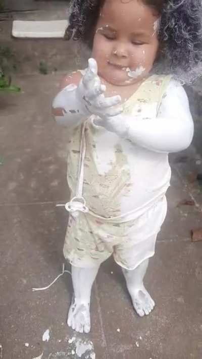 Kid playing with paint.. still cute though