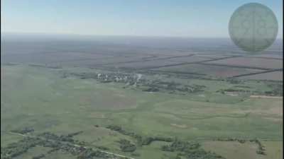 Unguided rocket impacts against Russian positions being recorded by drone (Probably fired by helicopter or jet). Novokarlivka village, Zaporizhzhia region. 08/May/2024.
