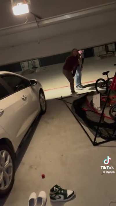 Crazy neighbors confront kids in their own garage over being flipped off
