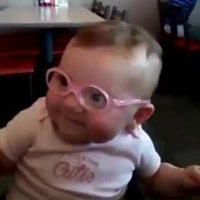 Little girl sees her mommy clearly for the first time