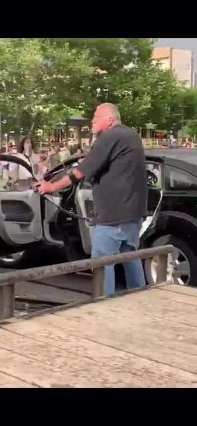 Guy with a bow at a BLM protest in 2020