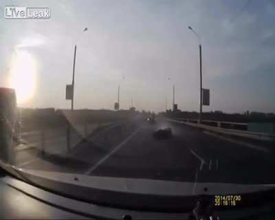 Man on motorbike Flips Onto Moving Car