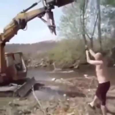 WCGW using a backhoe to try and make the water.