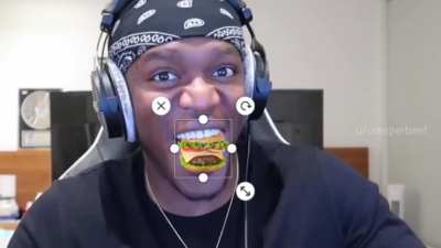 Feeding JJ a burger