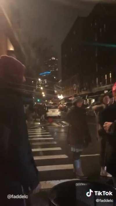 This Trump supporter gets roughed up in NYC after yelling "New York City is Trump country now" and blocking traffic with his MAGA flag