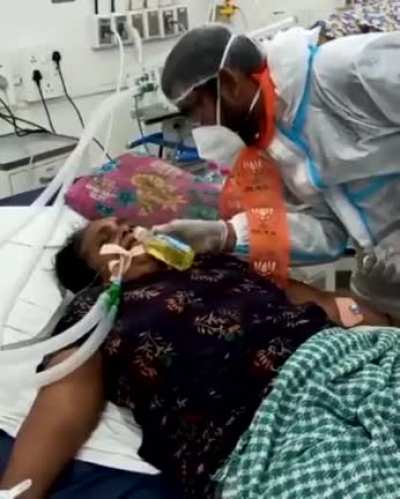 Politician feeding COW URINE to a COVID patient on ventilator.