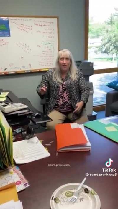 Scaring her coworker