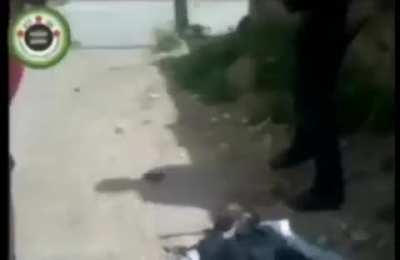 Syrian Rebel gets his face torn off after a tank round hits the building he was firing from