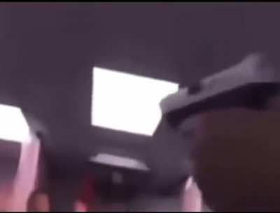 Guy runs out of hospital with pistol