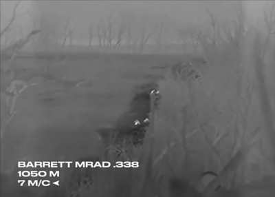 A sniper of the 🇺🇦 "Company Group" shot from a Barrett MRAD.338 rifle at a distance of 1050m