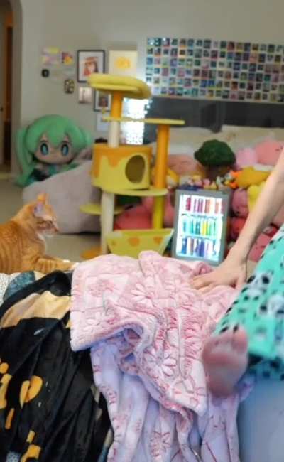 Emiru climbing into her chair - February 2026