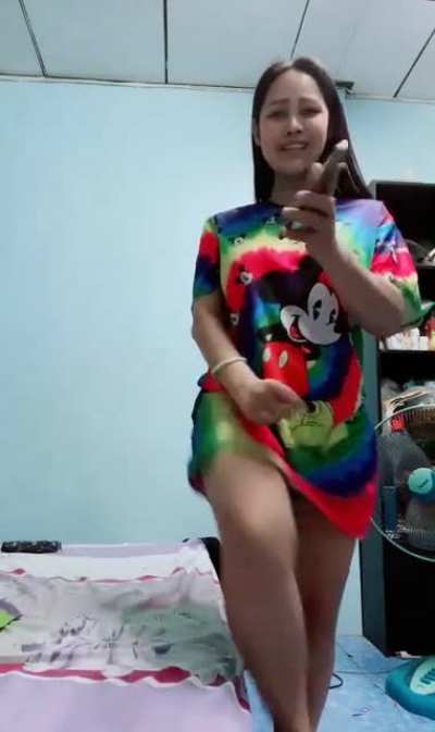 Wanna see what she has under her Mickey Mouse Shirt?