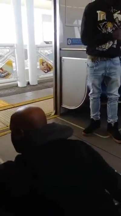 Guy on train learns the hard way about invading peoples personal space