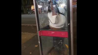 Please let me shit in peace in this cubicle.Which is a London Public Phone box.