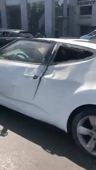 Idiot on his phone while driving a motorcycle in Beirut, Lebanon