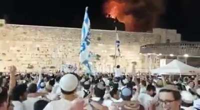 Israeli settlers gathered, watched and celebrated the fire at Al Aqsa Mosque