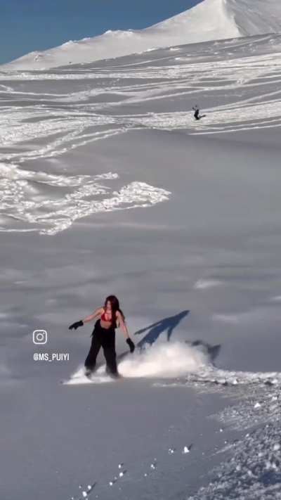 Bikini hot Asian on a snow board