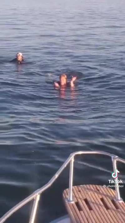 Although these people were being harassed at sea by some bigots, they chose to help when their boat burned down afterwards.