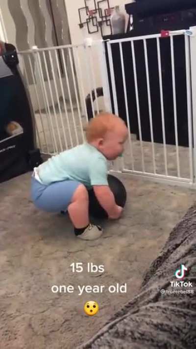 Weight lifting baby reps 15 pound ball
