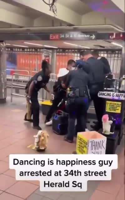 NYPD arresting Jazzajilo aka dancing cats jazz guy
