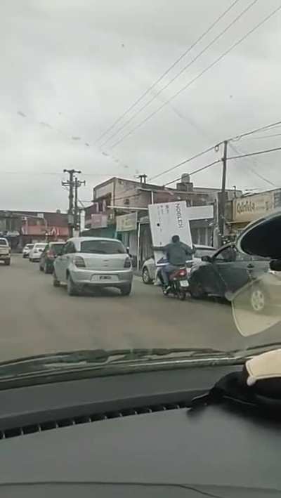transporting your new massive TV with a motorbike